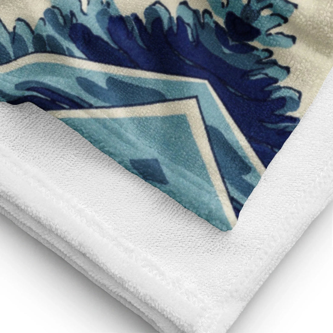 Fusing classical Japanese ukiyo-e aesthetics with pop humor, this design reimagines a famous cresting wave as the shaggy silhouette of a voracious blue puppet. Contact us with accessibility feedback, we'd love to help!