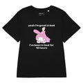 Great in Bed Women’s Tee - The bait-and-switch text layout flanking the innocent #D462A5 orchid-hooded character against the vibrant #F49AC1 bubblegum pink background, enhanced by the pale yellow bird perched atop for added whimsical contrast.