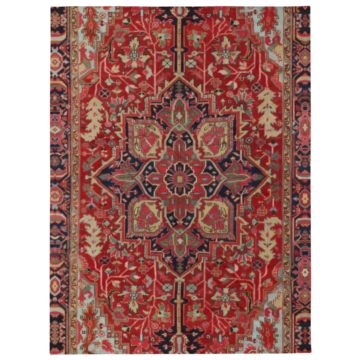 The Dudes Rug Plush Blanket - The specific symmetrical Heriz medallion set against a deep crimson (#8A2628) field, accented by midnight navy blue (#182136), antique cream (#E3DCC5), and muted slate teal (#7C9799), recontextualizing the rough texture of a floor covering into a soft comfort object.